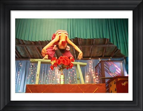 Framed Girl performing acrobatics, Shanghai, China Print