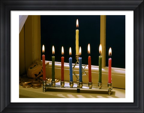 Framed Close-up of a menorah with burning candles and a Star of David Print