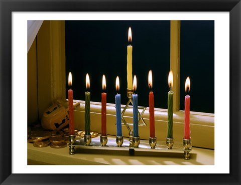 Framed Close-up of a menorah with burning candles and a Star of David Print