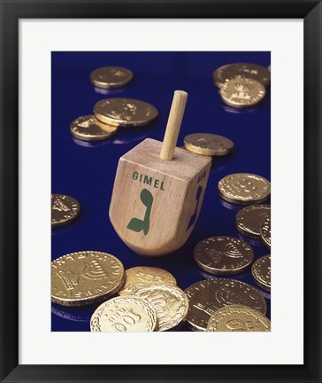 Framed Close-up of a Hanukkah dreidel with Hanukkah gelts Print