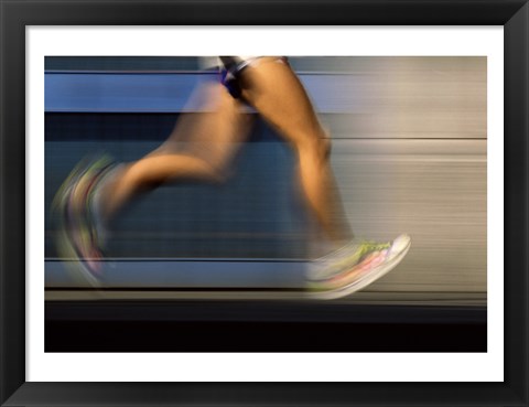 Framed Low section view of a person running on blue Print