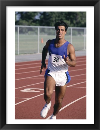 Framed Male athlete running on a running track Print