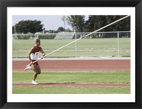 Framed Male athlete pole vaulting Print