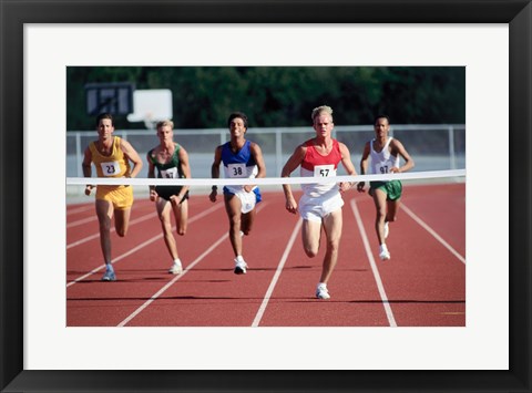 Framed Male athletes running on a running track Print