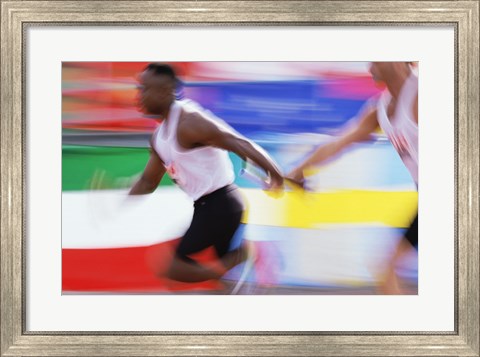 Framed Side profile of two young men passing a relay baton Print