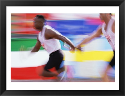 Framed Side profile of two young men passing a relay baton Print