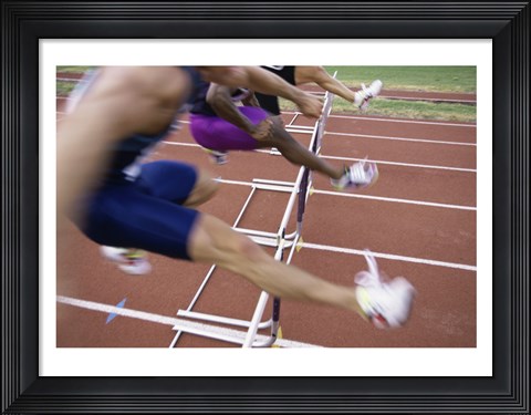 Framed Side profile of three people jumping a hurdle Print