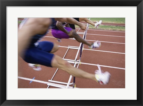 Framed Side profile of three people jumping a hurdle Print