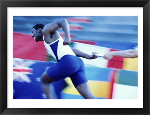 Framed Side profile of runners passing a baton in a relay race Print