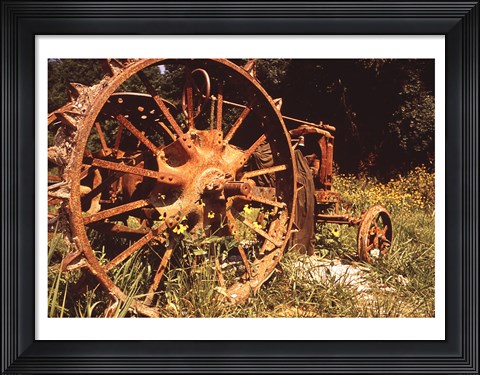 Framed Abandoned Tractor Near Mississippi River Bank Print