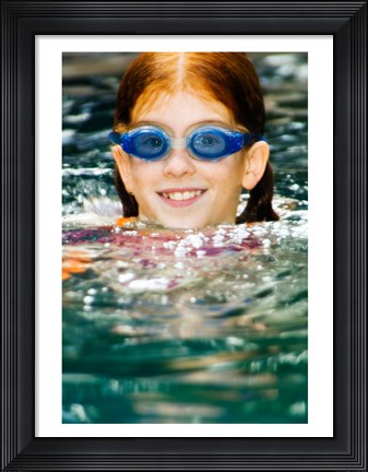 Framed Close-up of a girl in a swimming pool Print