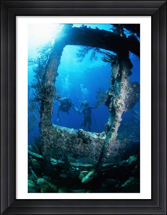 Framed Scuba diver investigating shipwrecks Print