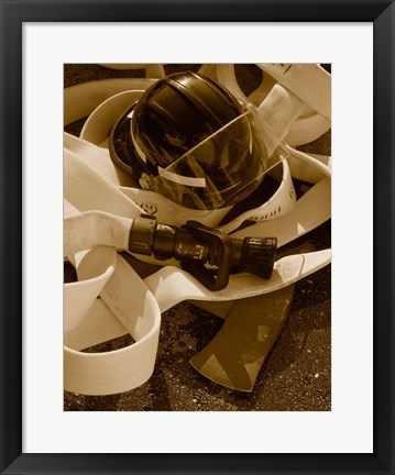 Framed Close-up of a firefighter&#39;s helmet on a fire hose Print