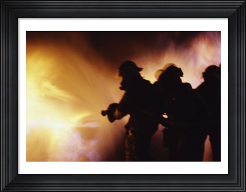 Framed Firefighters extinguishing a fire Print