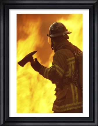 Framed Firefighter holding an axe Print