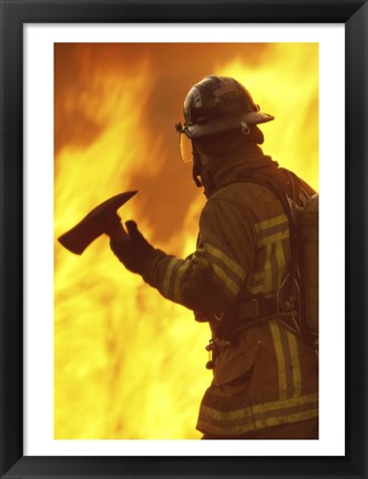 Framed Firefighter holding an axe Print