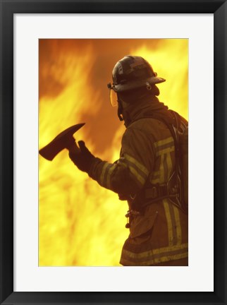 Framed Firefighter holding an axe Print