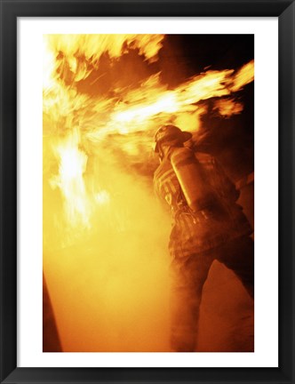 Framed Fireman fighting with fire flames Print