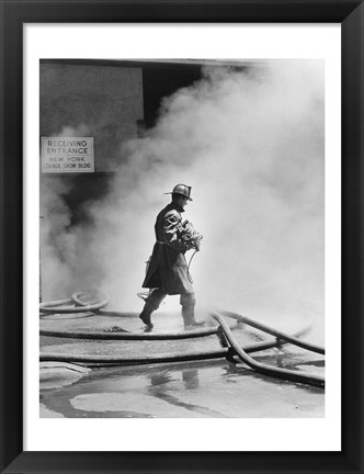 Framed Firefighter walking in front of smoke Print