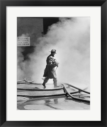 Framed Firefighter walking in front of smoke Print