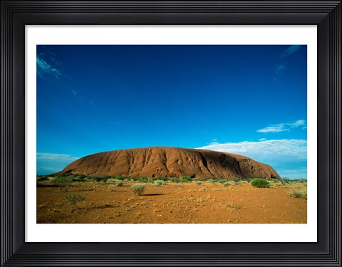 Framed Rock formation on a landscape, Ayers Rock, Uluru-Kata Tjuta National Park, Northern Territory, Australia Print