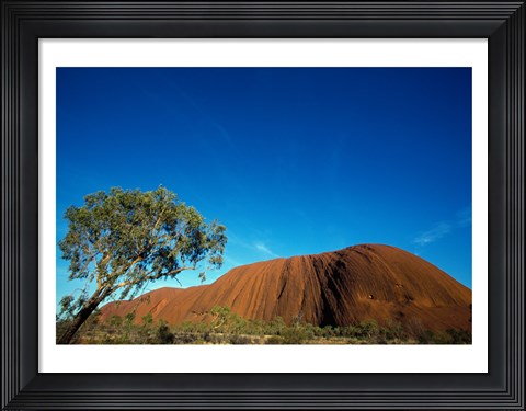 Framed Rock formation on a landscape, Ayers Rock, Uluru-Kata Tjuta National Park, Northern Territory, Australia Print