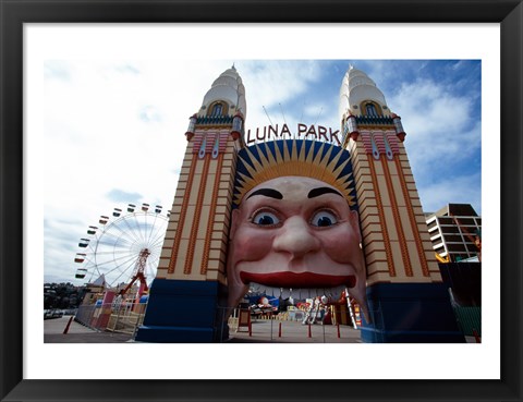 Framed Low angle view of the entrance to an amusement park, Luna Park, Sydney, New South Wales, Australia Print