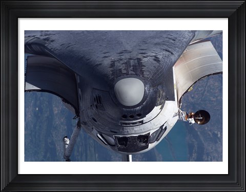 Framed Space Shuttle Discovery as it approached the International Space Station Print