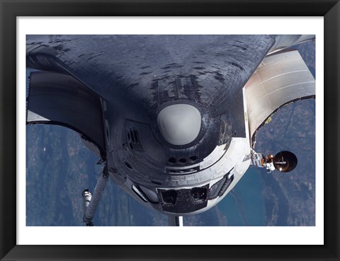 Framed Space Shuttle Discovery as it approached the International Space Station Print