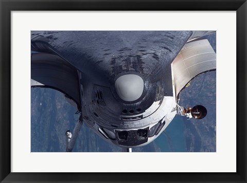 Framed Space Shuttle Discovery as it approached the International Space Station Print