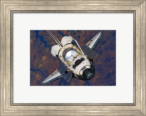 Framed Space Shuttle Discovery approaches the International Space Station Print