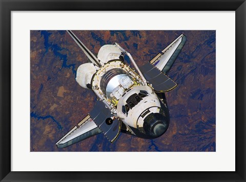 Framed Space Shuttle Discovery approaches the International Space Station Print