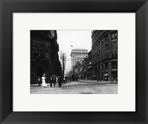 Framed Yonge Street at Front Street in Toronto Print