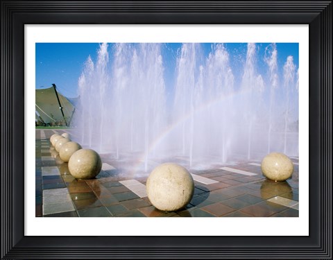 Framed USA, California, Stockton, Weber Point Events Center, Rainbow created by water splashing from fountain Print