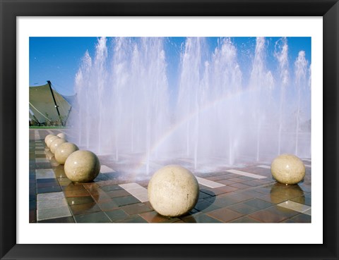 Framed USA, California, Stockton, Weber Point Events Center, Rainbow created by water splashing from fountain Print