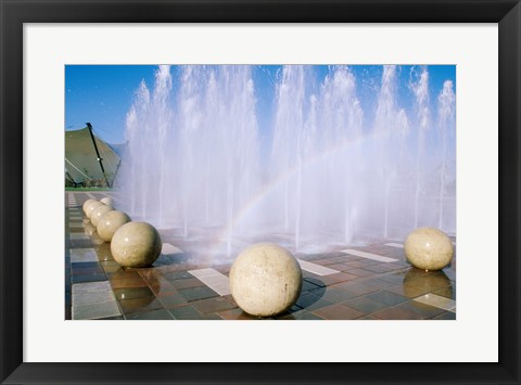 Framed USA, California, Stockton, Weber Point Events Center, Rainbow created by water splashing from fountain Print