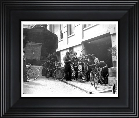 Framed Taking care of  maintenance of the racing bicycles during a rest day in Belfort Print