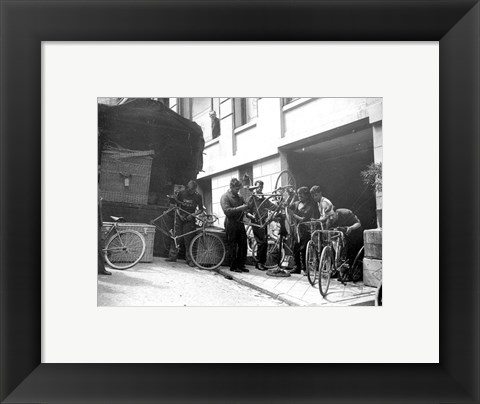 Framed Taking care of  maintenance of the racing bicycles during a rest day in Belfort Print