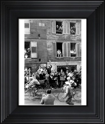 Framed People watching the cyclists being provisioned. Tour de France 1958. Print