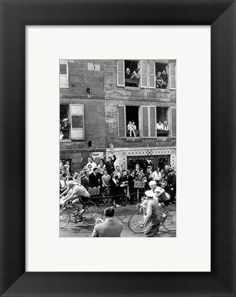 Framed People watching the cyclists being provisioned. Tour de France 1958. Print