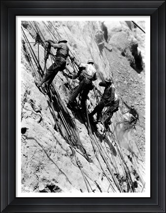 Framed Drillers at work on canyon wall above power plant location Print