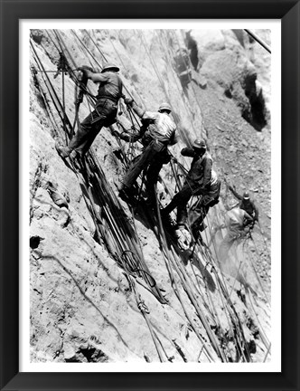 Framed Drillers at work on canyon wall above power plant location Print