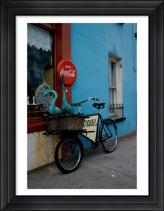 Framed Statues of swans in a basket on a bicycle, Lahinch, Ireland Print