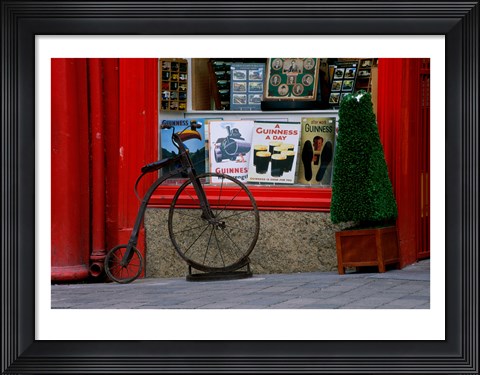Framed Old bicycle in front of a store, Kilkenny, Ireland Print