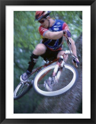 Framed Young man on a bicycle Print