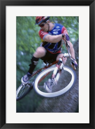 Framed Young man on a bicycle Print