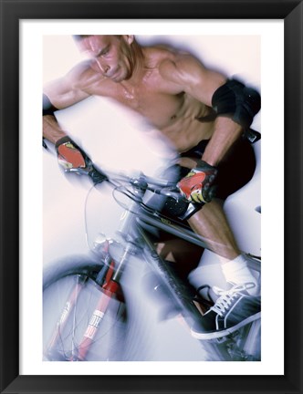 Framed Close-up of a young man riding a bicycle Print