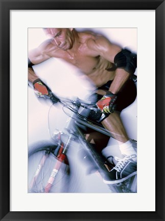 Framed Close-up of a young man riding a bicycle Print