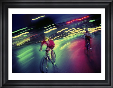 Framed Young man riding a bicycle Print