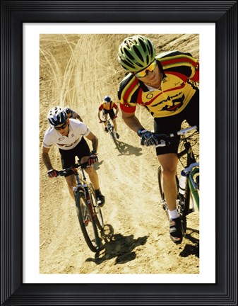 Framed Group of people riding bicycles in a race Print